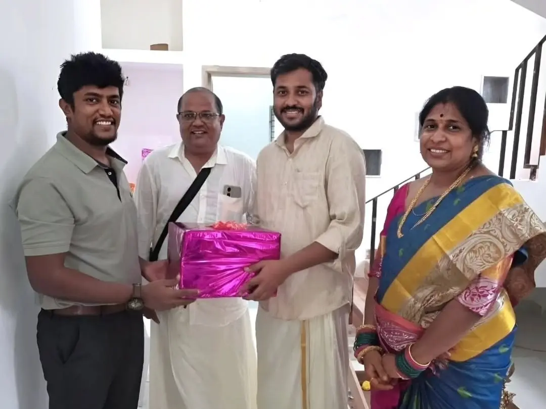 Founder gifting a client at handover